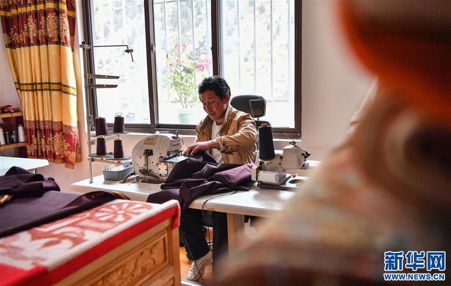 (決戰(zhàn)決勝脫貧攻堅·圖文互動)(2)搬出來的“幸福村”