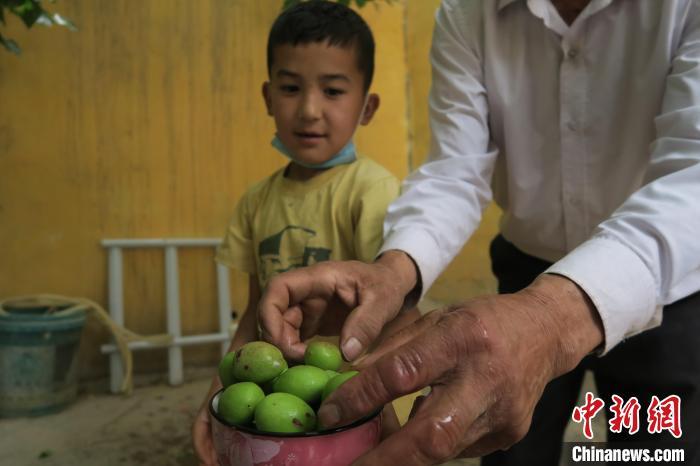 圖為進(jìn)藏先遣英雄連誓師地原址所在的新疆維吾爾自治區(qū)和田地區(qū)于田縣普魯村現(xiàn)貌?！畛坛?攝